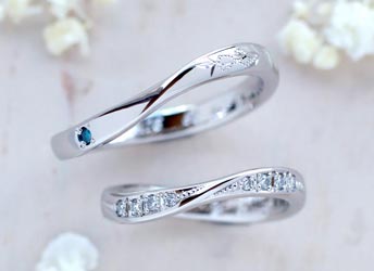 ねじれたメビウスの輪にダイヤとスズラン彫刻の手作り結婚指輪